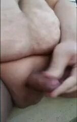 Jacking off while sitting on the steps by the back door