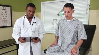 Submissive patient is examined by the black doctor