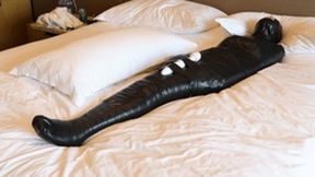 GG36 - A girl wrapped in duct tape reaches orgasm using a vibrator.