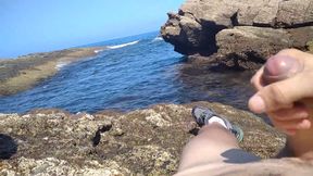 Jerking off a Big Hard Dick Overlooking the Sea in the Beach Cove Until He Cums