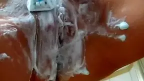 Kinky gal shaves her private parts while filming the process