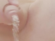 twink plays with his piss and ass