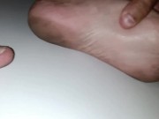 Twink is cleaning dirty feet