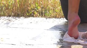 Blonde masturbating outdoor