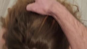 Curvy redhead gets on her knees and swallows for the first time