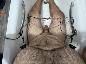 Cock and nipple bondage in the bath with hands free cumshot at the end