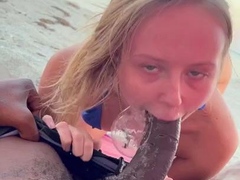 Horny MILF sucks and fucks big black cock on the beach