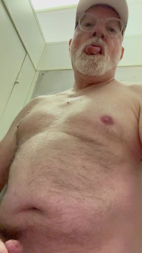 Bearstgt naked in a public restroom