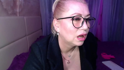 A cool busty vulgar mature bitch in glasses with a ponytail on her head...