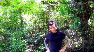 Tattooed Russian man receives an outdoor handjob from a woman in athletic pants