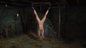 A witch screams out loud orgasms when ropes and chains are pulled over her cunt