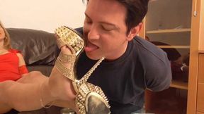 Mistress lets her slave lick her golden shoes