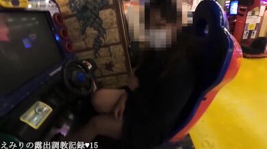 Chubby Japanese girl flashing her big tits at the arcade kink tryst
