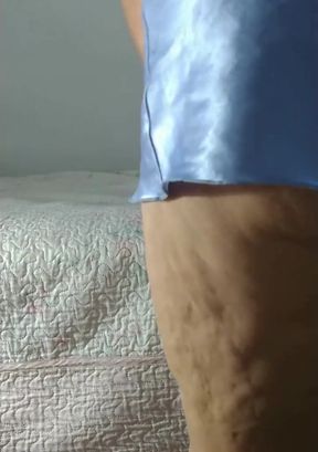 Horny stepmom makes a video for her followers on the internet.