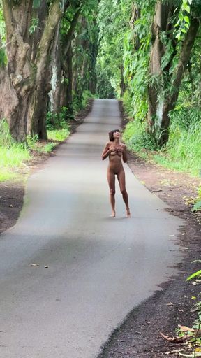Naked person jogging on road