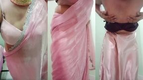 indian gay crossdresser gaurisissy pressing and playing with her big boobs looking in pink saree looking like a housewife