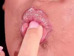 Smoking hot lesbian couple on sofa fucking each other with dildos