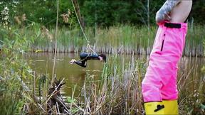 ”Lezdom babe in erotic assfucking domination by a quiet serene river”