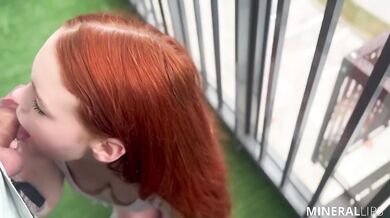Red haired girl deepthroats in public then gets creampie on loggia