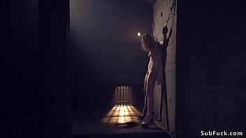 Brunette rough banged in dark dungeon