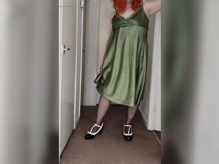 Hawt crossdresser green satin slide suit