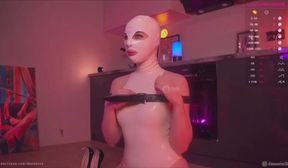 Latex slut plays with vibrator