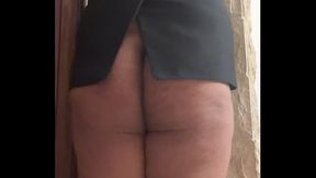 John is wearing a jacket and is naked from the waist down