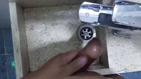 I jerk off in the hotel bathroom sink.