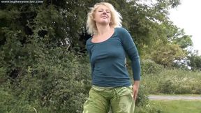 Rogue Rose wets her pants in a field