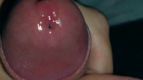 Very close-up of an over-excited penis and streams of pre-cum!
