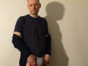 Kudoslong strips for the camera then with underpants around his neck as he masturbates