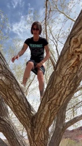 Piss Slut climbs up a tree to piss off branch!