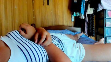 A Japanese woman masturbates her nipples while talking dirty.