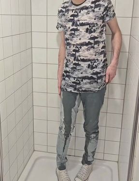 Playing in shower fully clothed in jeans and chucks