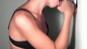 Beautiful and sexy girl sucking my dick through a gloryhole