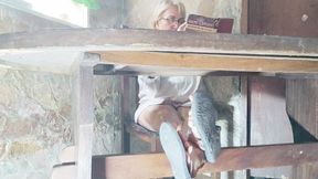 Diana Senior enjoying a foot tickling session with her slave