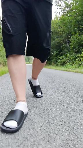 In Slippers and White Socks in Nature