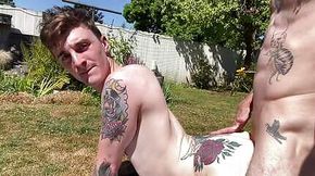 Daddy fucks tatted boy in the backyard