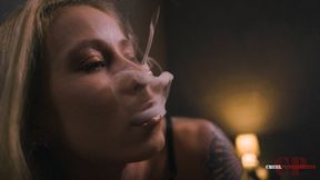 Her arms around a pillow, smoking 4K MP4