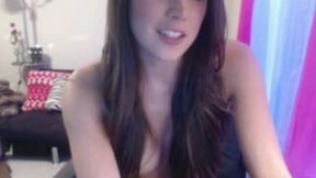 Slender and rather pale amateur webcam brunette posed in her thongs