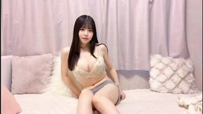 Shy girl teases her pussy in sensual solo session