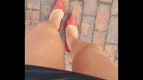 Pauline is taking a walk outside in my heels and skirt