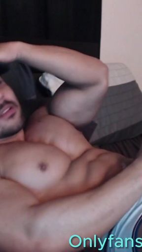 Key moment from "Muscular College Jock with Big Cock Shows Off Underwear And Fills Them With Cum For Fan"