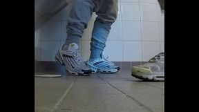 Amateur boys in sneakers wank and try handjob in public toilets'_ urinal