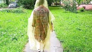 chick inside a raincoat flashing boobs and butt on the