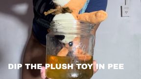 DIP THE PLUSH TOY IN PEE
