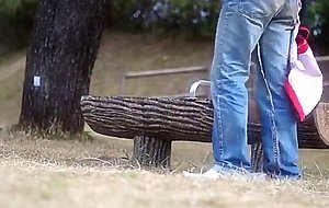 A young gay having a good wank in public