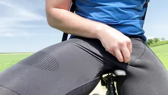 Biker with hard cock bulging in tight pants outdoors