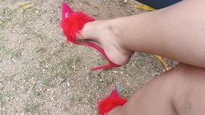 Red high heels pumping car pedals (3)