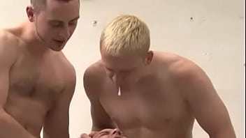 two guys spit on slave